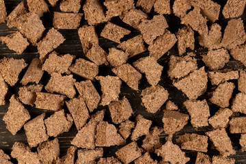 small pieces of cork bark for domestic use, randomly scattered on the table, top view