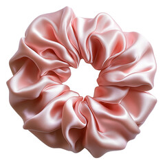 A silk scrunchie in pastel pink isolated on white background