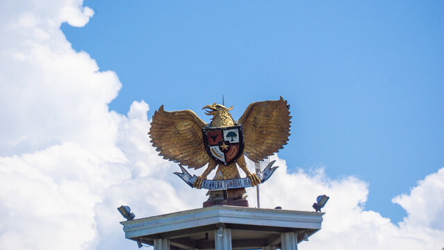 Garuda Pancasila (Indonesian five principles) with a blue sky background