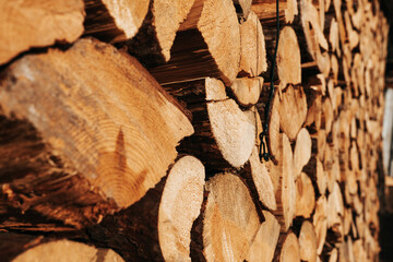 stack of chopped firewood. solid fuel.Preparation and storage of firewood for the heating...