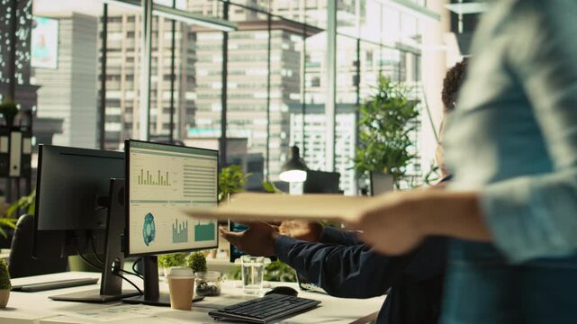 Angry manager in office berating worker for not hitting revenue key performance targets. Upset management executive fighting with employee at work scolding him for low output, camera B