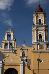 Bell towers  with bright yellow and white colour