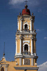 Obraz premium Bell tower with bright yellow and white colour