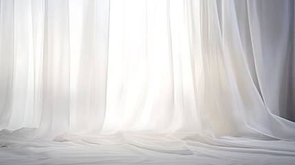 Obraz premium Soft, translucent white curtains draping elegantly against a bright, diffused light source creating an airy and tranquil atmosphere