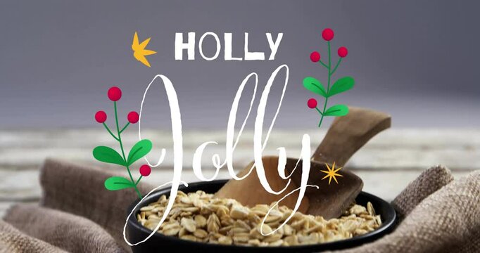Festive decorations with animation over bowl of oats on rustic table