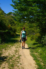 Adult woman's walk in the forest