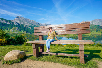 Woman on top of the highest bench in the León communi