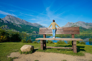Woman on top of the highest bench in the León communi