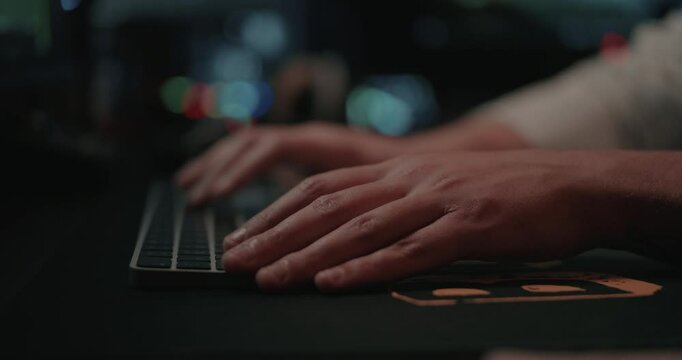 Film editor&rsquo;s Hands typing on a keyboard and mouse