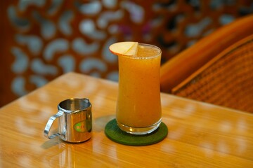 A glass of Apple Juice on the table.Healthy drink. Jus apel