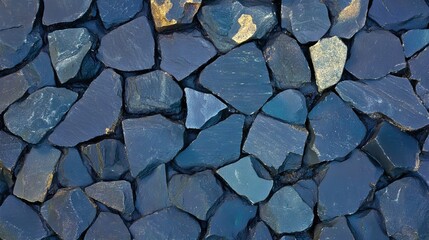 Fototapeta premium Stone wall. Blue and black, irregular stones. Textured background. Natural, rustic