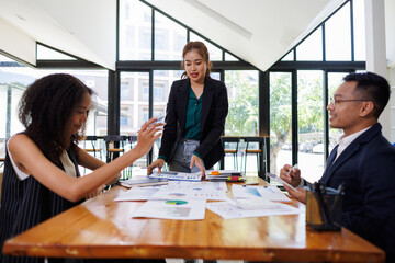 Financial Business analyze the graph of the company's performance to create profits and growth, Market research reports and income statistics, Financial and Accounting meeting concept.	