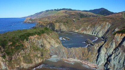 Coastal cliffs along California's Highway 1 in Northern California. Rugged ocean rocks, crashing...