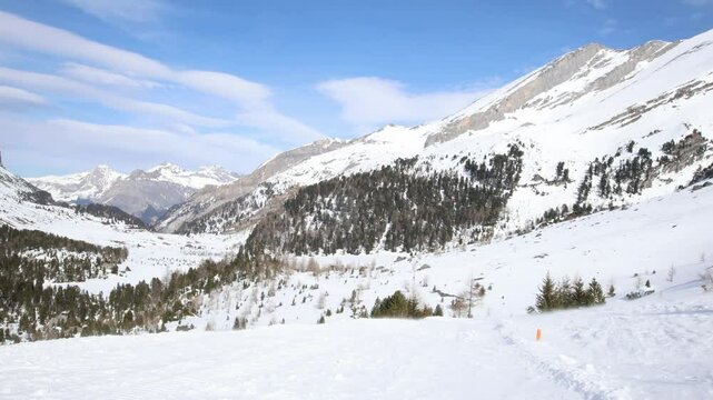 Winter mountain landscape with snow marker buried in the snow