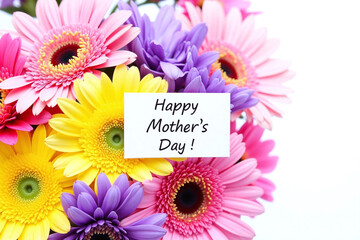 bouquet of colorful flowers with a happy mothers day card