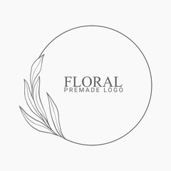 Vector floral hand drawn logo template in elegant and minimal style with black color on grey background illustration. Circle frames logos. For badges, labels, logotypes and branding business identity.