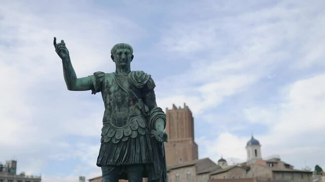 Bronze historical statue of Julius Cezar emperor, a landmark in ancient architecture of Rome, Italy