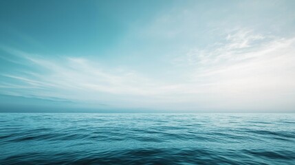 Fototapeta premium Expansive Minimalist Ocean View Under a Soft Blue Sky