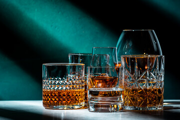 Strong hard alcoholic drinks, spirits, liqueurs, distillates, whiskey and others. Drink background...