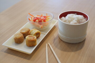a neatly presented meal consisting of three components