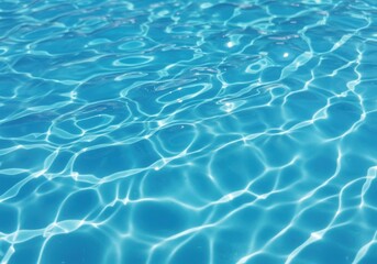 A close up view of the rippling water surface with sunlight creating patterns on the water bed