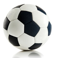 Black and white patterned ball resting on a reflective white surface