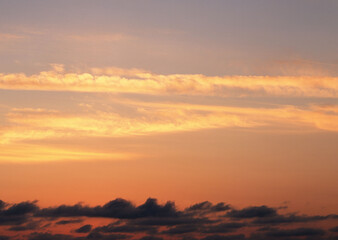 Sunset sky with orange clouds