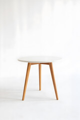 Round table with wooden legs on white background studio shot minimalist style