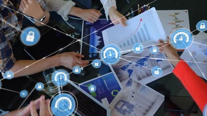 Analyzing charts with digital security icons overlay, business team in meeting room - Powered by Adobe