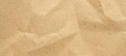 Abstract crumpled and creased recycle brown paper texture background