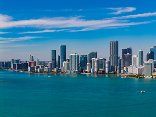 Fototapeta premium Panorama of Miami. Aerial view of modern skyscraper in downtown Miami, Brickell Key. Skyline of Miami. Brickell city center. Modern city building and skyscraper. City downtown skyline