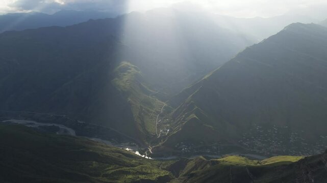 Beautiful view of the mountains at sunset. Aerial view of the gorge near Goor village in Dagestan, Caucasus, Russia. Summer landscape 
