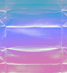 Holographic foil texture with Iridescent colors. Multicolored background - metallic plastic-coated food packaging - abstraction for creative poster, experimental design, music banner or cover