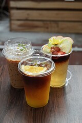Close up of Iced orange Americano or espresso coffee is refreshing fusion black orange coffee...