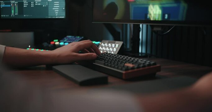 Video game live streamer&rsquo;s hands moving a keyboard and mouse
