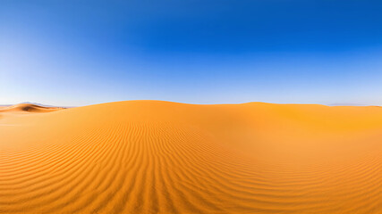 Stunning golden sand dunes under a clear blue sky create a serene desert landscape. Perfect for travel, nature, and relaxation themes. Evokes peace and wanderlust in visuals.