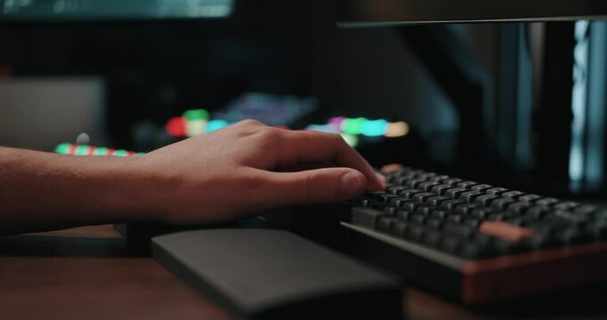 Video game live streamer&rsquo;s hands moving a keyboard and mouse