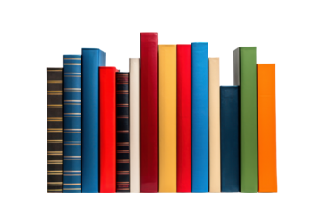 A vertical tower of books in bold primary colors, carefully balanced Isolated on white background