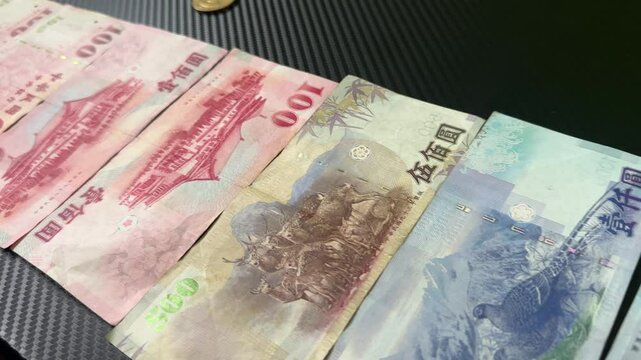New taiwan dollar currency cash money coins and bills