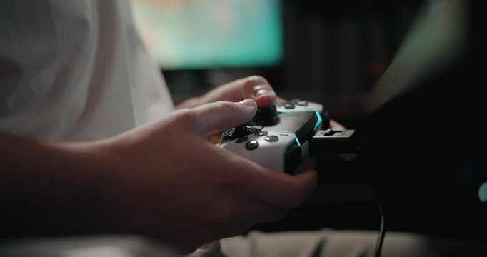 Video game live streamer&rsquo;s hands using a controller 