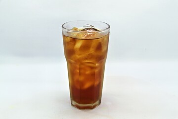 Unsweetened iced tea, known as Es Teh Tawar in Indonesia. A simple, refreshing drink served cold with ice cubes—perfect for cleansing the palate on a hot day.