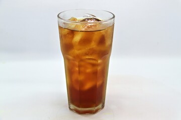 Unsweetened iced tea, known as Es Teh Tawar in Indonesia. A simple, refreshing drink served cold with ice cubes—perfect for cleansing the palate on a hot day.