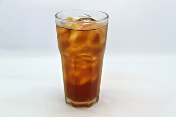 Unsweetened iced tea, known as Es Teh Tawar in Indonesia. A simple, refreshing drink served cold with ice cubes—perfect for cleansing the palate on a hot day.