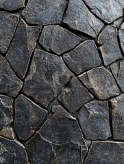 Fototapeta premium Textured Dark Stone Surface with Cracks and Irregular Pieces for Background and Design Use