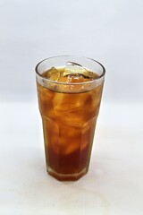 Unsweetened iced tea, known as Es Teh Tawar in Indonesia. A simple, refreshing drink served cold with ice cubes—perfect for cleansing the palate on a hot day.