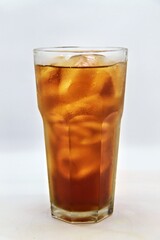 Unsweetened iced tea, known as Es Teh Tawar in Indonesia. A simple, refreshing drink served cold with ice cubes—perfect for cleansing the palate on a hot day.