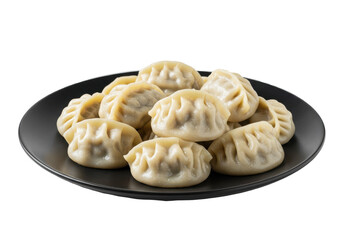 Steaming plate of freshly made dumplings on a black dish, ready to serve