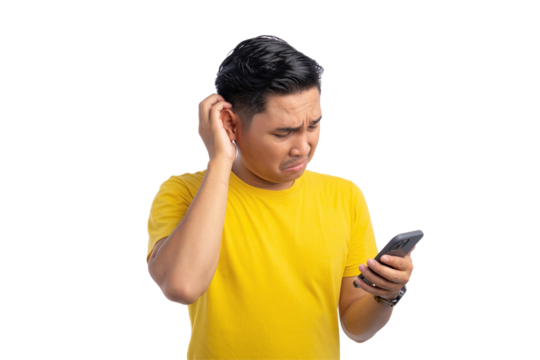 Handsome young Asian man holding mobile phone and scratching his head, confused about something isolated on transparent background - Powered by Adobe