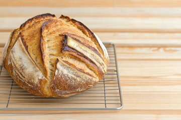 A freshly baked weekend bread cooling on a rack, ideal for cooking enthusiasts.