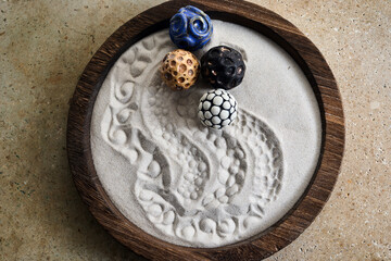 Textured Sand and Patterned Stones